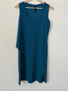 Porto San Francisco Asymmetrical Sleeveless Dress in a muted blue color